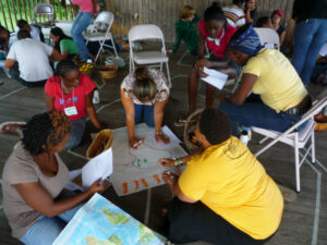 Seeds of Fire campers share their experiences and strategize together. 